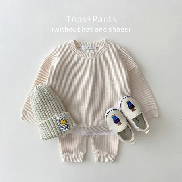 Baby Knit Autumn Clothes featuring cozy knit sweaters and cardigans for fall, designed to keep babies warm and stylish.